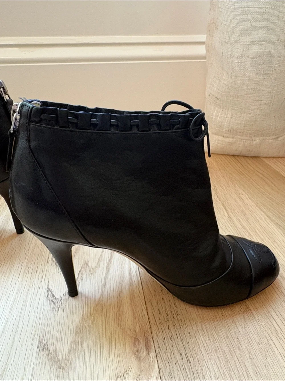 CHANEL Black Leather Ankle Booties with Bow-Trim and CC Toe